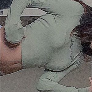 soft green crop top with an open string back